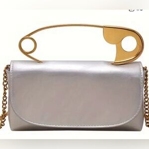 Silver Clutch with Gold Safety Pin Handle